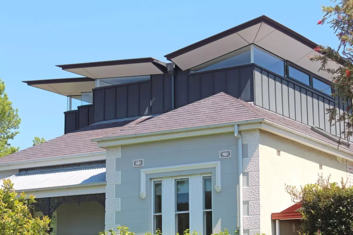 modern home with butterfly roof
