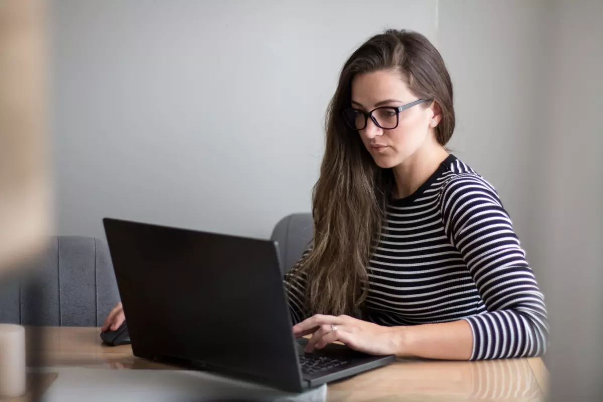 Dining-room table being used as a computer desk