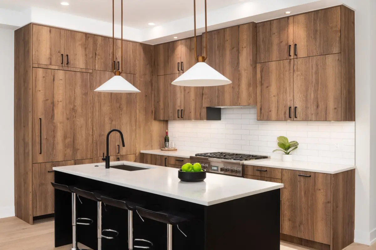 Kitchen interior with wooden kitchen cabinets and black island