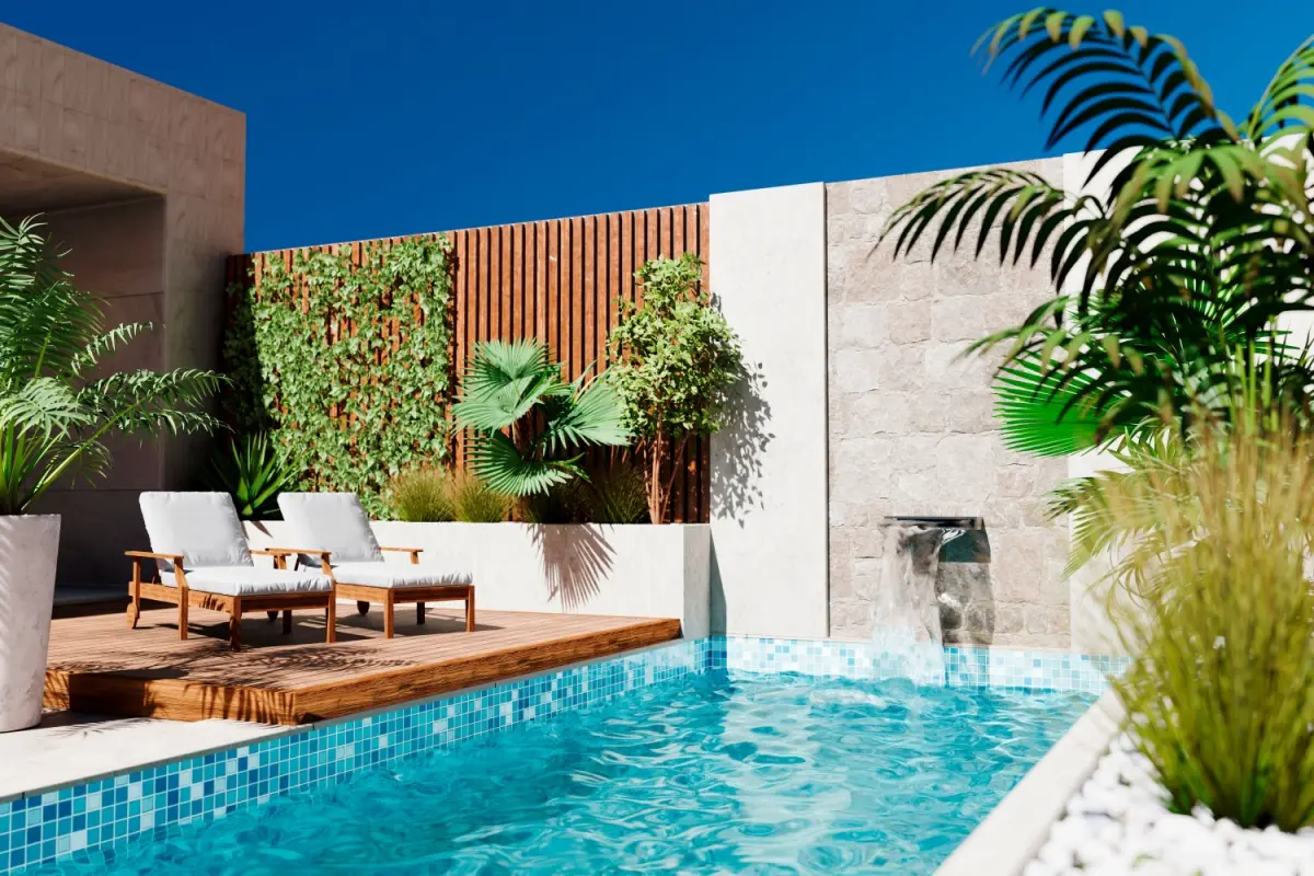 Outdoor swimming pool with palm trees and two loungers.